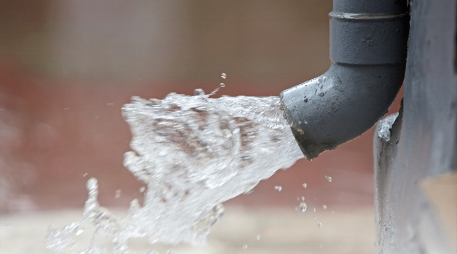 How to Clean Out a Clogged Gutter Downspout