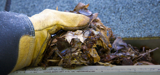 hand cleaning gutter